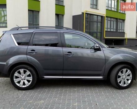 Серый Мицубиси Аутлендер, объемом двигателя 2.27 л и пробегом 291 тыс. км за 9700 $, фото 3 на Automoto.ua