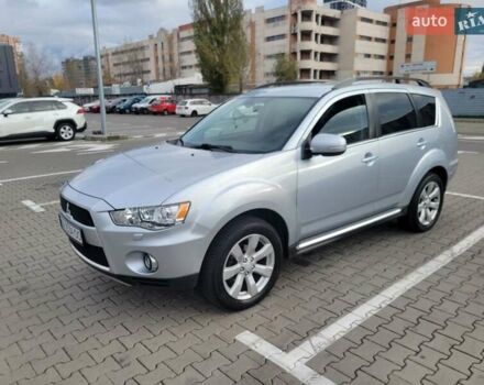 Серый Мицубиси Аутлендер, объемом двигателя 2.2 л и пробегом 175 тыс. км за 10999 $, фото 2 на Automoto.ua