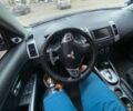 Серый Мицубиси Аутлендер, объемом двигателя 2 л и пробегом 217 тыс. км за 11800 $, фото 5 на Automoto.ua
