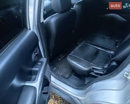 Серый Мицубиси Аутлендер, объемом двигателя 2 л и пробегом 205 тыс. км за 9600 $, фото 2 на Automoto.ua