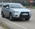 Серый Мицубиси Аутлендер, объемом двигателя 2 л и пробегом 205 тыс. км за 9600 $, фото 1 на Automoto.ua