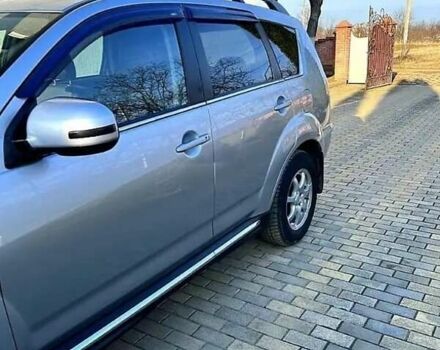 Серый Мицубиси Аутлендер, объемом двигателя 2.2 л и пробегом 248 тыс. км за 11000 $, фото 2 на Automoto.ua