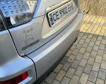 Серый Мицубиси Аутлендер, объемом двигателя 2.2 л и пробегом 248 тыс. км за 11000 $, фото 22 на Automoto.ua