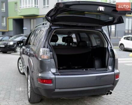Серый Мицубиси Аутлендер, объемом двигателя 2.27 л и пробегом 291 тыс. км за 9700 $, фото 8 на Automoto.ua