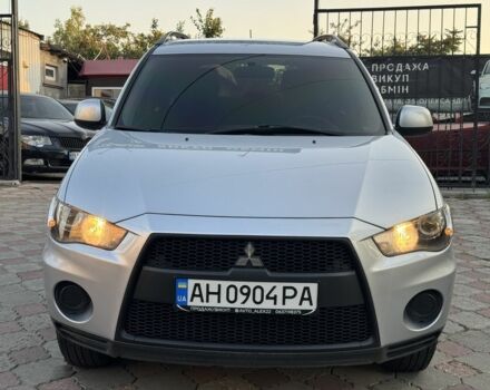 Серый Мицубиси Аутлендер, объемом двигателя 2.4 л и пробегом 188 тыс. км за 10999 $, фото 1 на Automoto.ua