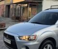 Серый Мицубиси Аутлендер, объемом двигателя 2.4 л и пробегом 188 тыс. км за 10999 $, фото 3 на Automoto.ua