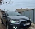 Серый Мицубиси Аутлендер, объемом двигателя 2.36 л и пробегом 190 тыс. км за 10499 $, фото 1 на Automoto.ua