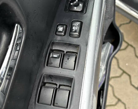 Серый Мицубиси Аутлендер, объемом двигателя 2.18 л и пробегом 233 тыс. км за 11000 $, фото 20 на Automoto.ua