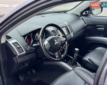 Серый Мицубиси Аутлендер, объемом двигателя 2.2 л и пробегом 160 тыс. км за 11350 $, фото 17 на Automoto.ua