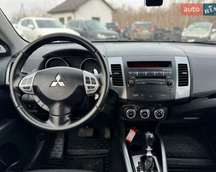 Серый Мицубиси Аутлендер, объемом двигателя 2.2 л и пробегом 211 тыс. км за 11999 $, фото 27 на Automoto.ua