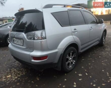 Серый Мицубиси Аутлендер, объемом двигателя 2 л и пробегом 205 тыс. км за 9600 $, фото 6 на Automoto.ua