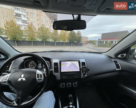 Серый Мицубиси Аутлендер, объемом двигателя 2.18 л и пробегом 220 тыс. км за 10999 $, фото 46 на Automoto.ua