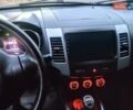 Серый Мицубиси Аутлендер, объемом двигателя 2 л и пробегом 205 тыс. км за 9600 $, фото 1 на Automoto.ua