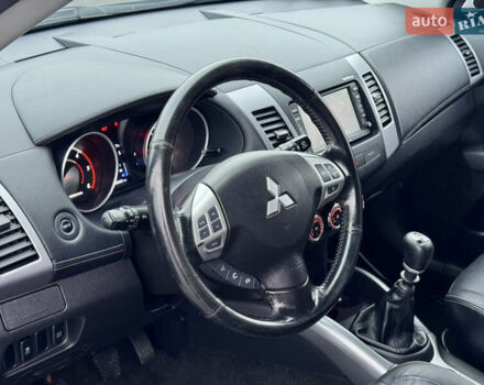 Серый Мицубиси Аутлендер, объемом двигателя 2.2 л и пробегом 160 тыс. км за 11350 $, фото 19 на Automoto.ua