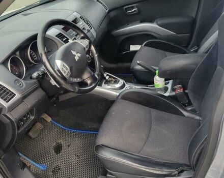 Серый Мицубиси Аутлендер, объемом двигателя 2.2 л и пробегом 175 тыс. км за 10999 $, фото 4 на Automoto.ua