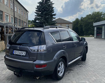 Серый Мицубиси Аутлендер, объемом двигателя 2.27 л и пробегом 220 тыс. км за 11300 $, фото 1 на Automoto.ua