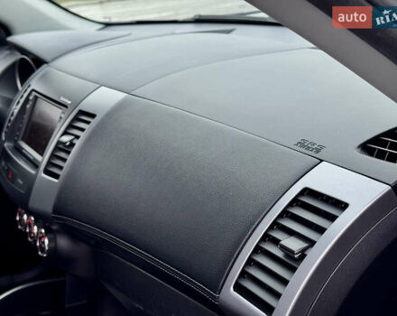 Серый Мицубиси Аутлендер, объемом двигателя 2.2 л и пробегом 160 тыс. км за 11350 $, фото 37 на Automoto.ua