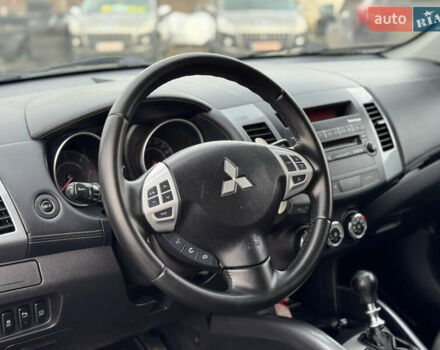 Серый Мицубиси Аутлендер, объемом двигателя 2.2 л и пробегом 211 тыс. км за 11999 $, фото 13 на Automoto.ua