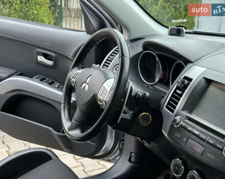 Серый Мицубиси Аутлендер, объемом двигателя 2.36 л и пробегом 145 тыс. км за 11200 $, фото 33 на Automoto.ua