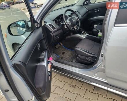 Серый Мицубиси Аутлендер, объемом двигателя 2.2 л и пробегом 175 тыс. км за 10999 $, фото 7 на Automoto.ua