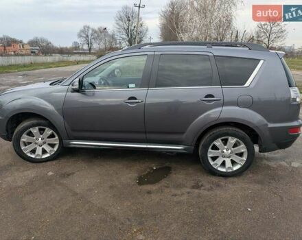 Серый Мицубиси Аутлендер, объемом двигателя 2.2 л и пробегом 204 тыс. км за 10200 $, фото 2 на Automoto.ua