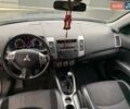 Серый Мицубиси Аутлендер, объемом двигателя 2.2 л и пробегом 250 тыс. км за 11000 $, фото 33 на Automoto.ua