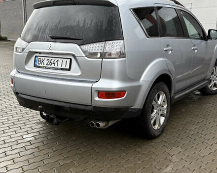 Серый Мицубиси Аутлендер, объемом двигателя 2.18 л и пробегом 233 тыс. км за 11000 $, фото 6 на Automoto.ua