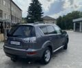Сірий Міцубісі Аутлендер, об'ємом двигуна 2.3 л та пробігом 215 тис. км за 11150 $, фото 1 на Automoto.ua