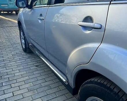 Серый Мицубиси Аутлендер, объемом двигателя 2.2 л и пробегом 248 тыс. км за 11000 $, фото 7 на Automoto.ua