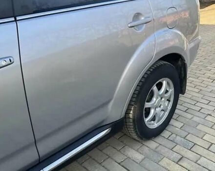 Серый Мицубиси Аутлендер, объемом двигателя 2.2 л и пробегом 248 тыс. км за 11000 $, фото 16 на Automoto.ua