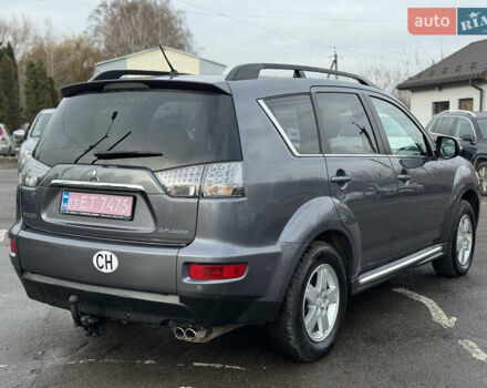 Серый Мицубиси Аутлендер, объемом двигателя 2.2 л и пробегом 211 тыс. км за 11999 $, фото 4 на Automoto.ua