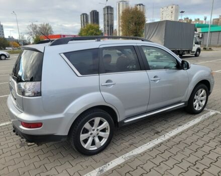 Серый Мицубиси Аутлендер, объемом двигателя 2.2 л и пробегом 175 тыс. км за 10999 $, фото 2 на Automoto.ua