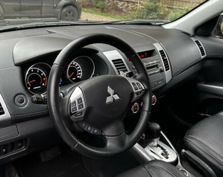 Серый Мицубиси Аутлендер, объемом двигателя 2.4 л и пробегом 226 тыс. км за 10200 $, фото 24 на Automoto.ua