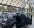 Серый Мицубиси Аутлендер, объемом двигателя 2.2 л и пробегом 250 тыс. км за 11000 $, фото 3 на Automoto.ua