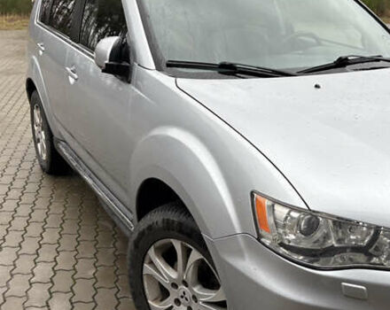 Серый Мицубиси Аутлендер, объемом двигателя 2.18 л и пробегом 233 тыс. км за 11000 $, фото 9 на Automoto.ua