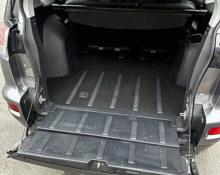 Серый Мицубиси Аутлендер, объемом двигателя 2.4 л и пробегом 226 тыс. км за 10200 $, фото 34 на Automoto.ua