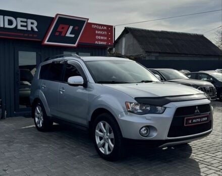 Серый Мицубиси Аутлендер, объемом двигателя 2.4 л и пробегом 239 тыс. км за 11700 $, фото 1 на Automoto.ua