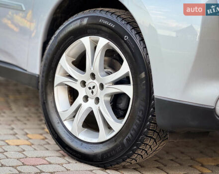 Серый Мицубиси Аутлендер, объемом двигателя 2.2 л и пробегом 189 тыс. км за 12800 $, фото 13 на Automoto.ua