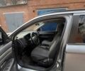 Серый Мицубиси Аутлендер, объемом двигателя 2.36 л и пробегом 136 тыс. км за 13300 $, фото 1 на Automoto.ua