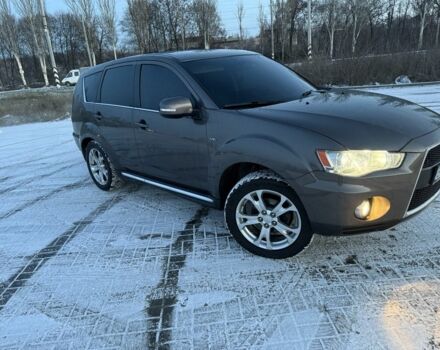 Серый Мицубиси Аутлендер, объемом двигателя 3 л и пробегом 220 тыс. км за 7700 $, фото 2 на Automoto.ua