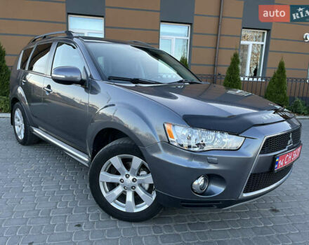 Серый Мицубиси Аутлендер, объемом двигателя 2.2 л и пробегом 186 тыс. км за 12350 $, фото 1 на Automoto.ua