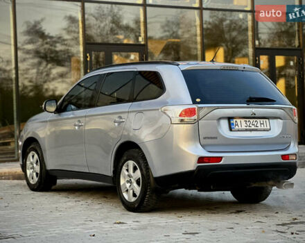 Сірий Міцубісі Аутлендер, об'ємом двигуна 2.36 л та пробігом 225 тис. км за 10500 $, фото 7 на Automoto.ua