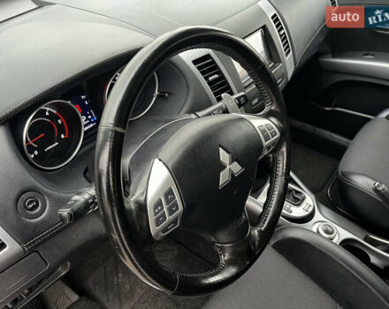 Серый Мицубиси Аутлендер, объемом двигателя 2.2 л и пробегом 206 тыс. км за 11999 $, фото 21 на Automoto.ua