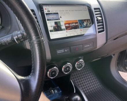 Серый Мицубиси Аутлендер, объемом двигателя 2 л и пробегом 136 тыс. км за 14999 $, фото 2 на Automoto.ua