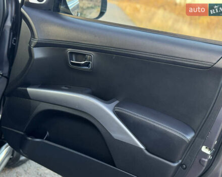 Серый Мицубиси Аутлендер, объемом двигателя 2.2 л и пробегом 171 тыс. км за 12700 $, фото 75 на Automoto.ua