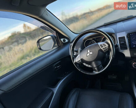 Серый Мицубиси Аутлендер, объемом двигателя 2.2 л и пробегом 171 тыс. км за 12700 $, фото 80 на Automoto.ua