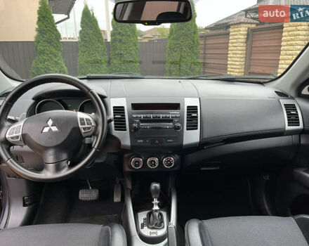 Серый Мицубиси Аутлендер, объемом двигателя 2.2 л и пробегом 186 тыс. км за 12350 $, фото 38 на Automoto.ua