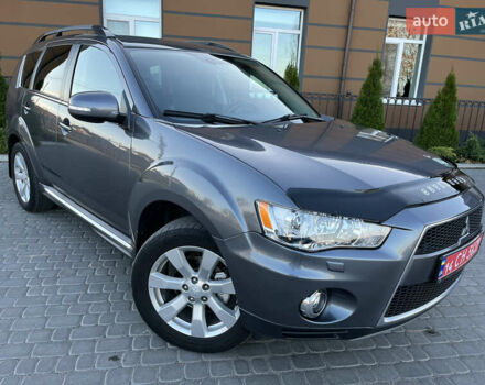 Серый Мицубиси Аутлендер, объемом двигателя 2.2 л и пробегом 186 тыс. км за 12350 $, фото 2 на Automoto.ua