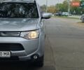 Сірий Міцубісі Аутлендер, об'ємом двигуна 2.36 л та пробігом 179 тис. км за 9800 $, фото 1 на Automoto.ua