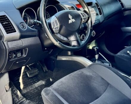 Серый Мицубиси Аутлендер, объемом двигателя 2.4 л и пробегом 239 тыс. км за 11700 $, фото 10 на Automoto.ua